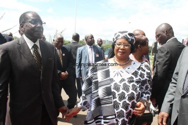 We are honoured that you are here, President Joyce Banda tells Zimbabwean Leader Robert Mugabe at the African Leaders Forum on Disability