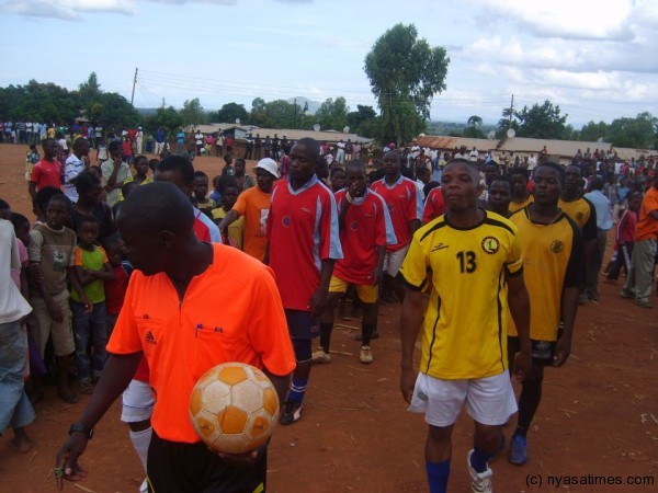 Teams line up during the launching ceremony