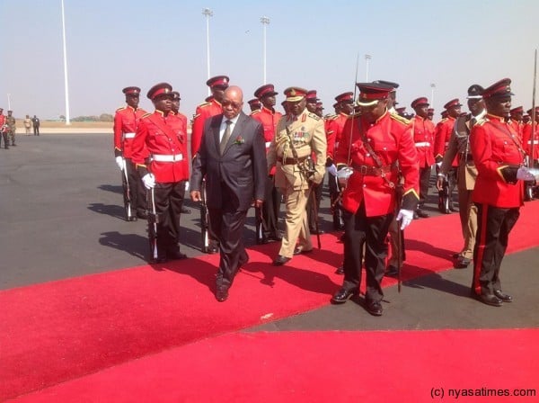 Zuma after inspecting a presidential guard of honour mounted by the Malawi Defence Force on his arrival