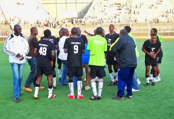Tigers players and their officials dancing for their victory