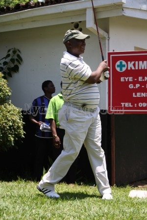 General Henery Odilo looks at the ball he played at the Golf Club.
