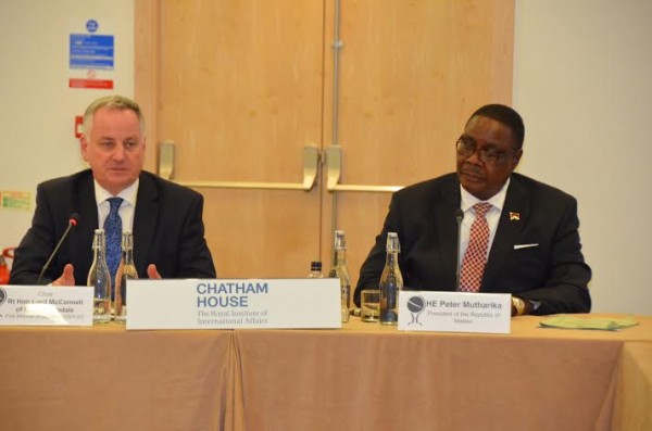 APM addressing members of Chatham House flanked by McConnel former First Minister of Scotland