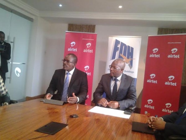 Airtel Money Country Director Francis Matseketsa and FDH Acting Managing Director briefing journalists