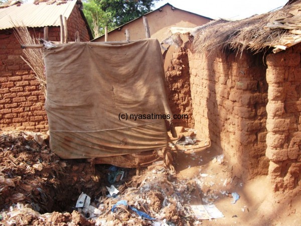 Poorest Malawi: Bin, Bathroom, Toilet, Playground - All in one place