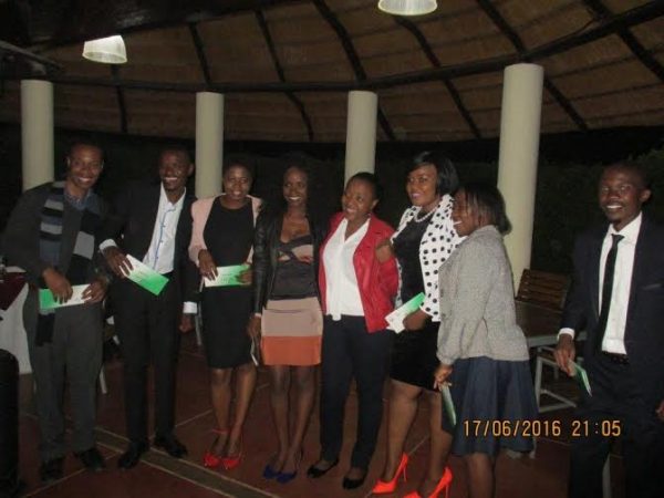 Graduate traininees with their air tickets