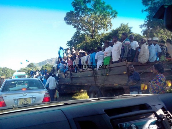 Supporters transported in trucks