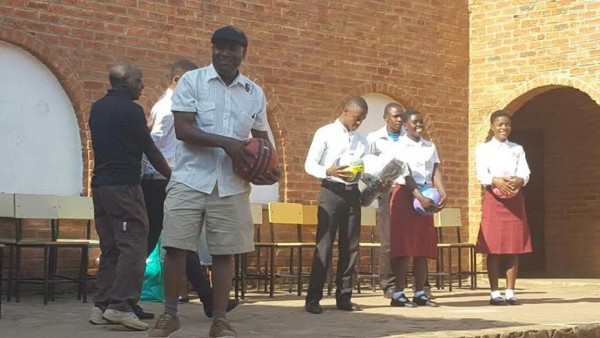 Making the donation at Malamulo