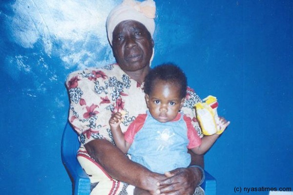 Mercy with her gran Lucy before her adoption- Photo The Mirror Newspaper