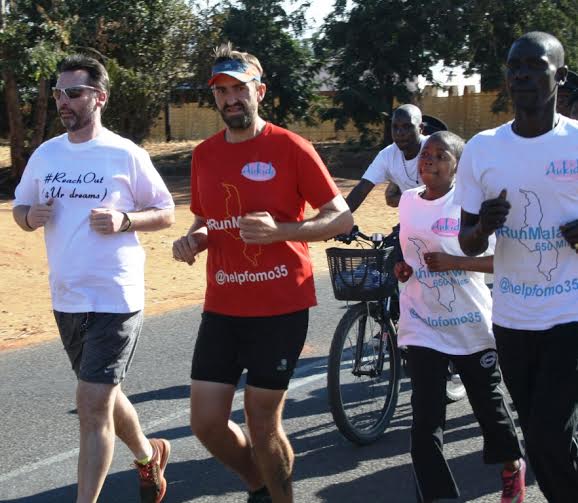 Nevin (left) joins Randall in the charity run