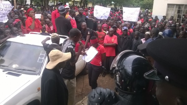 Organiser reading the petition.-Photo Edwin Mwauuluka