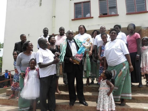 St Don Bosco Ward pose for a group photo with the trophy.