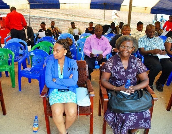 Unilver Malawi boss Chikondi Ng'ombe (left) says product will be recycled into soap