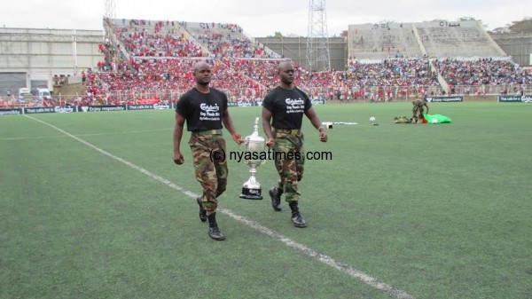 Soldiers brought the trophy in style